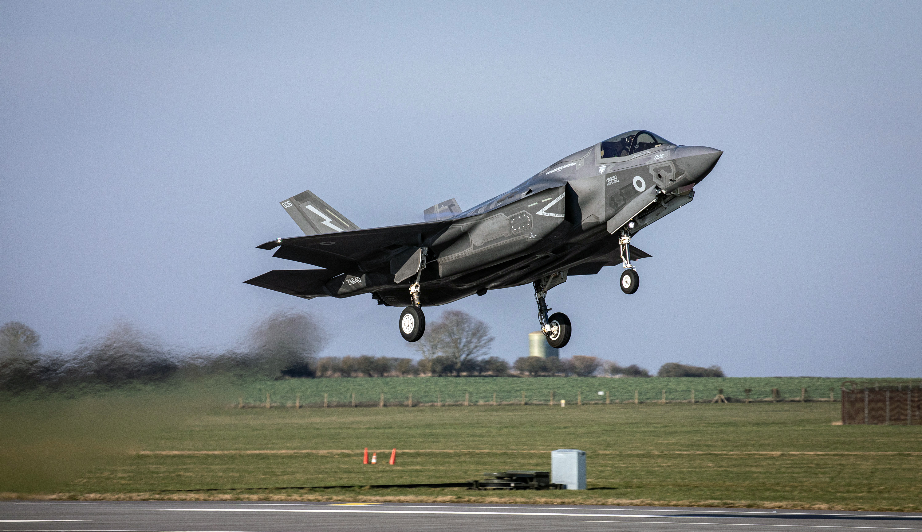 Defence aircraft taking off from runway