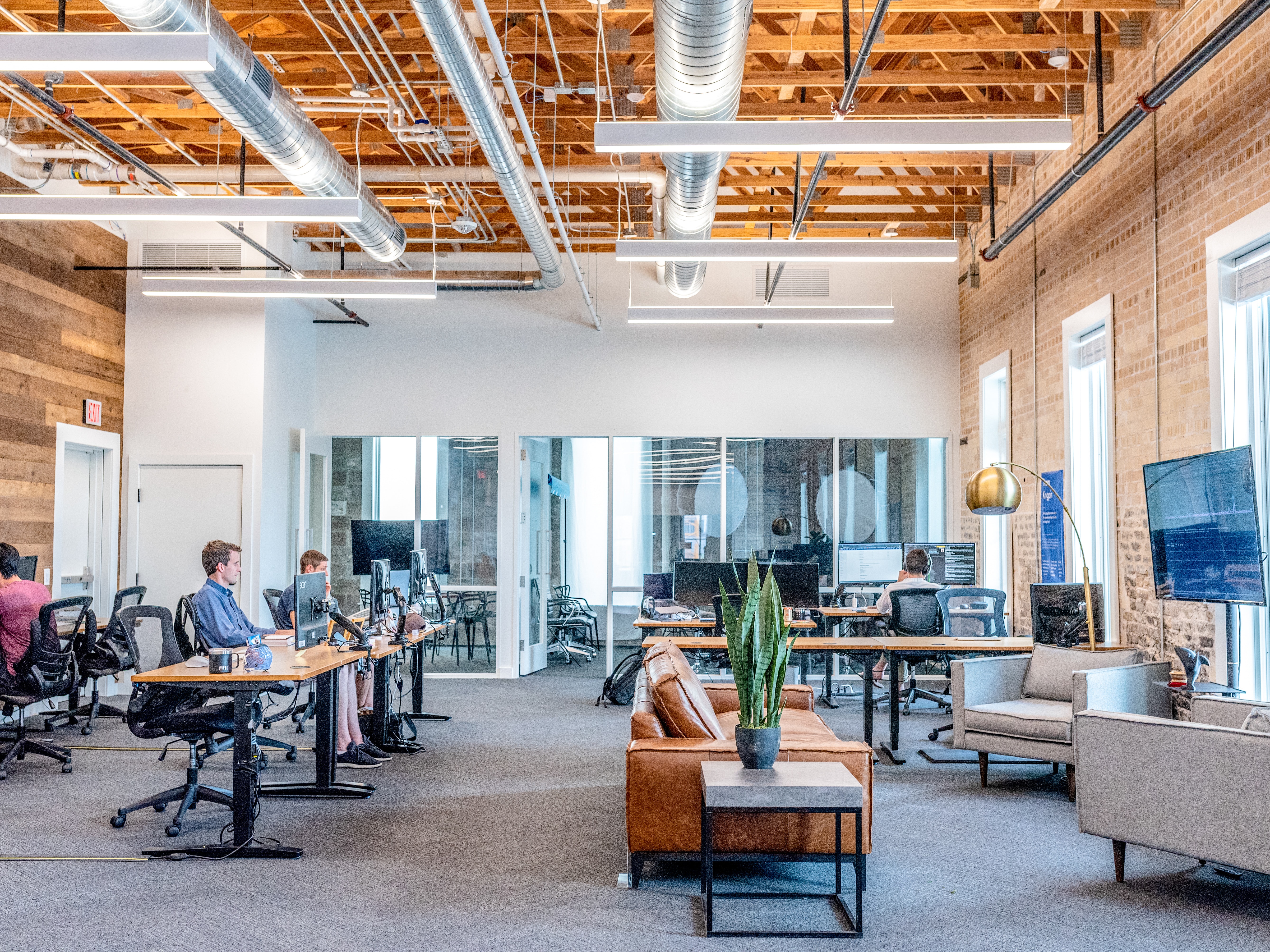 Interior commercial office space with staff working at desks