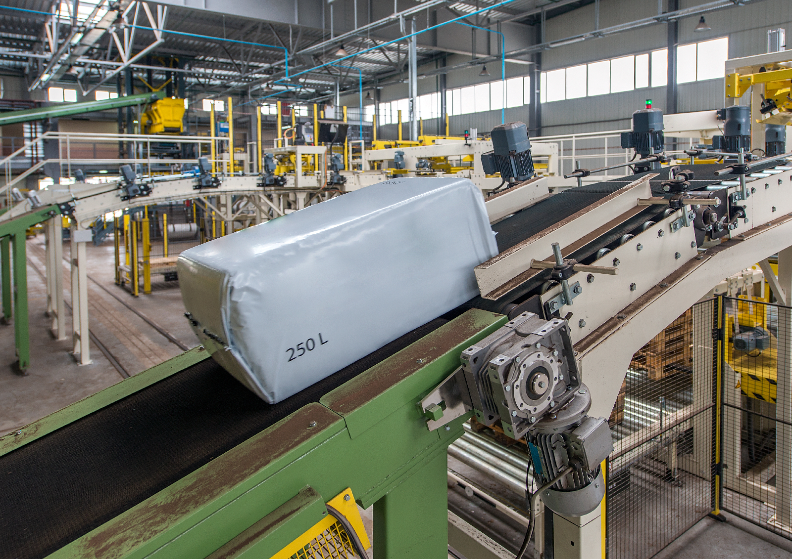 A conveyor belt inside a peat extraction, waste processing and composting facility.