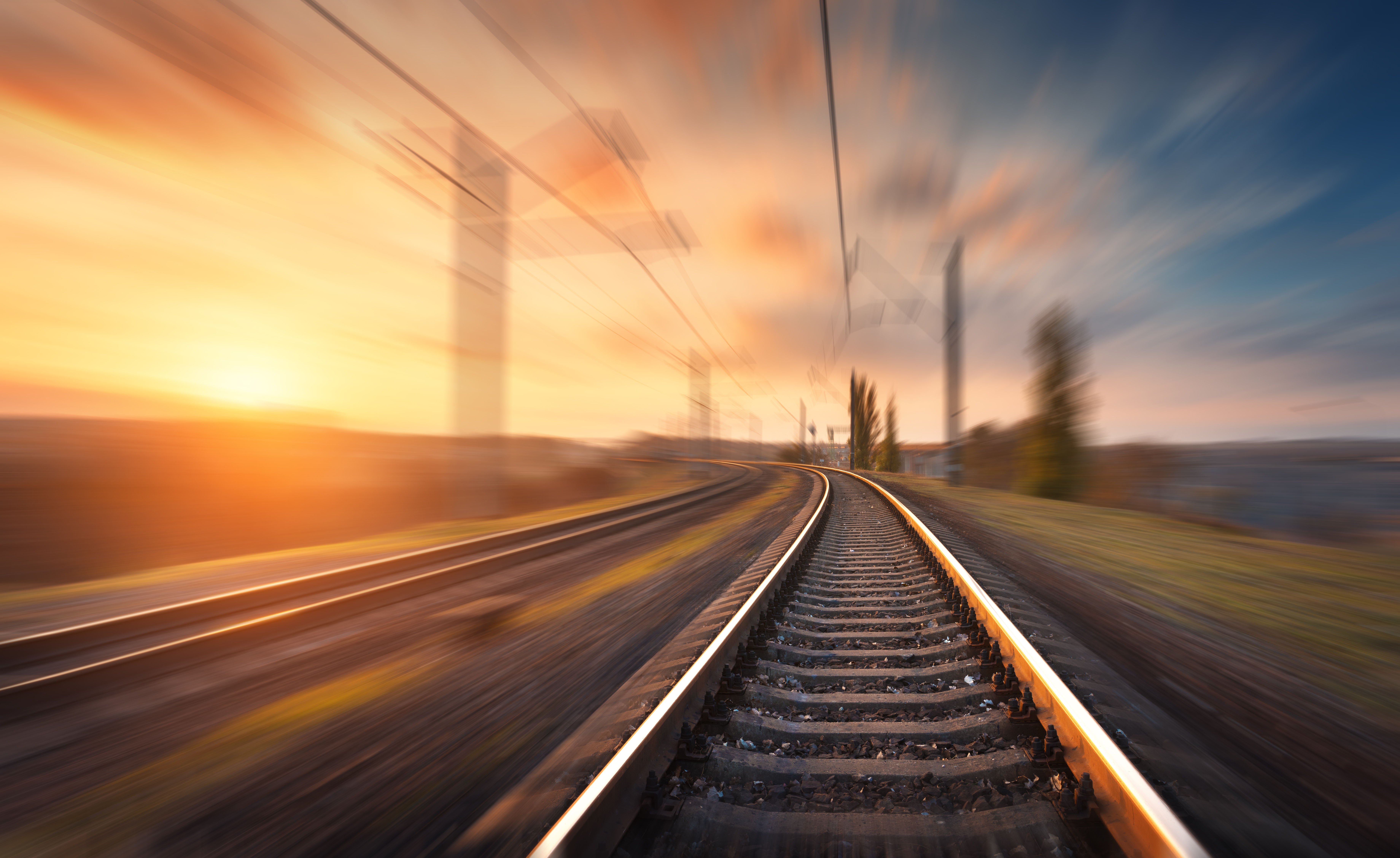 Fast tracked infrastructure shown through blurred rail line