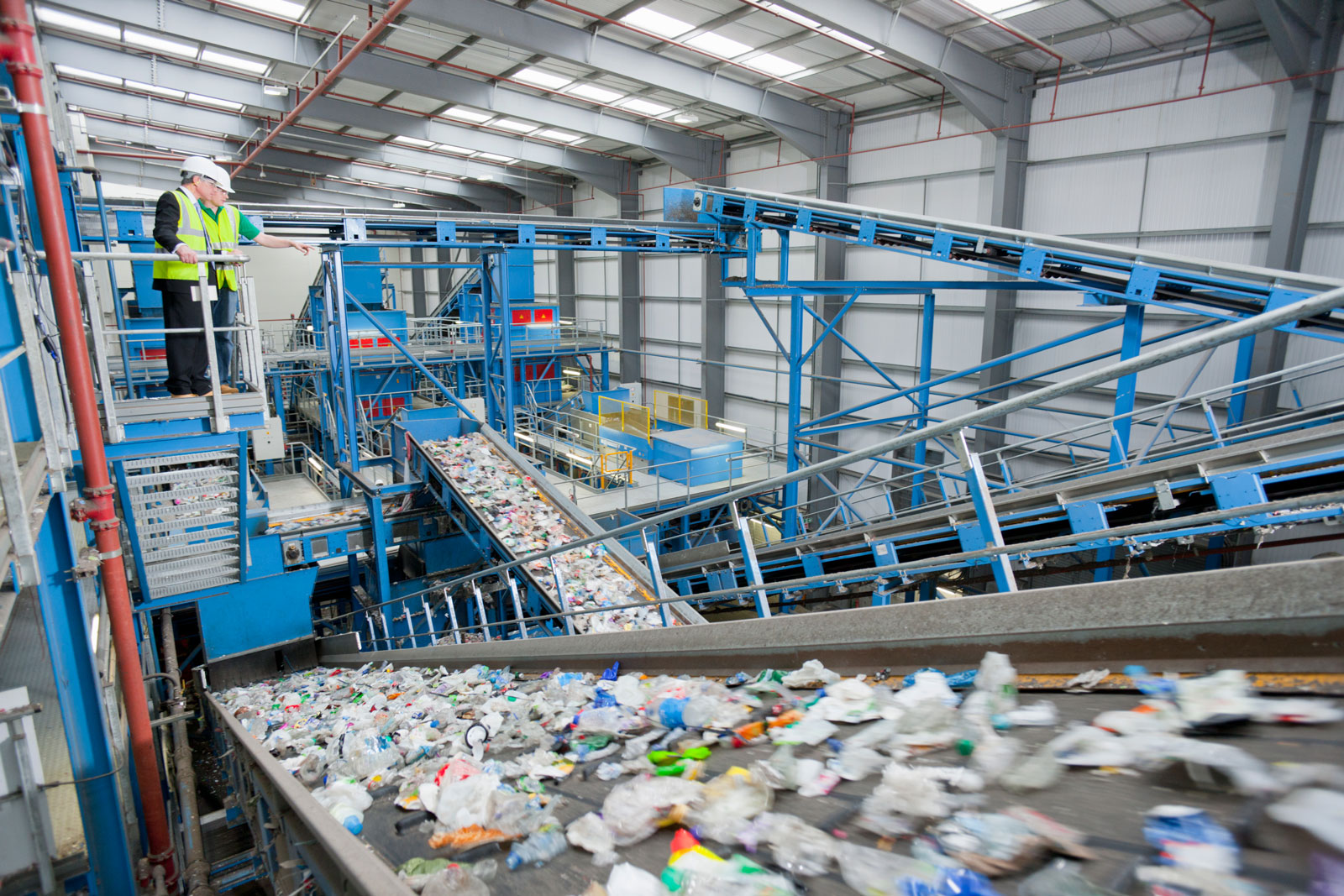 Recycling plant with plastic bottles on a conveyor belt