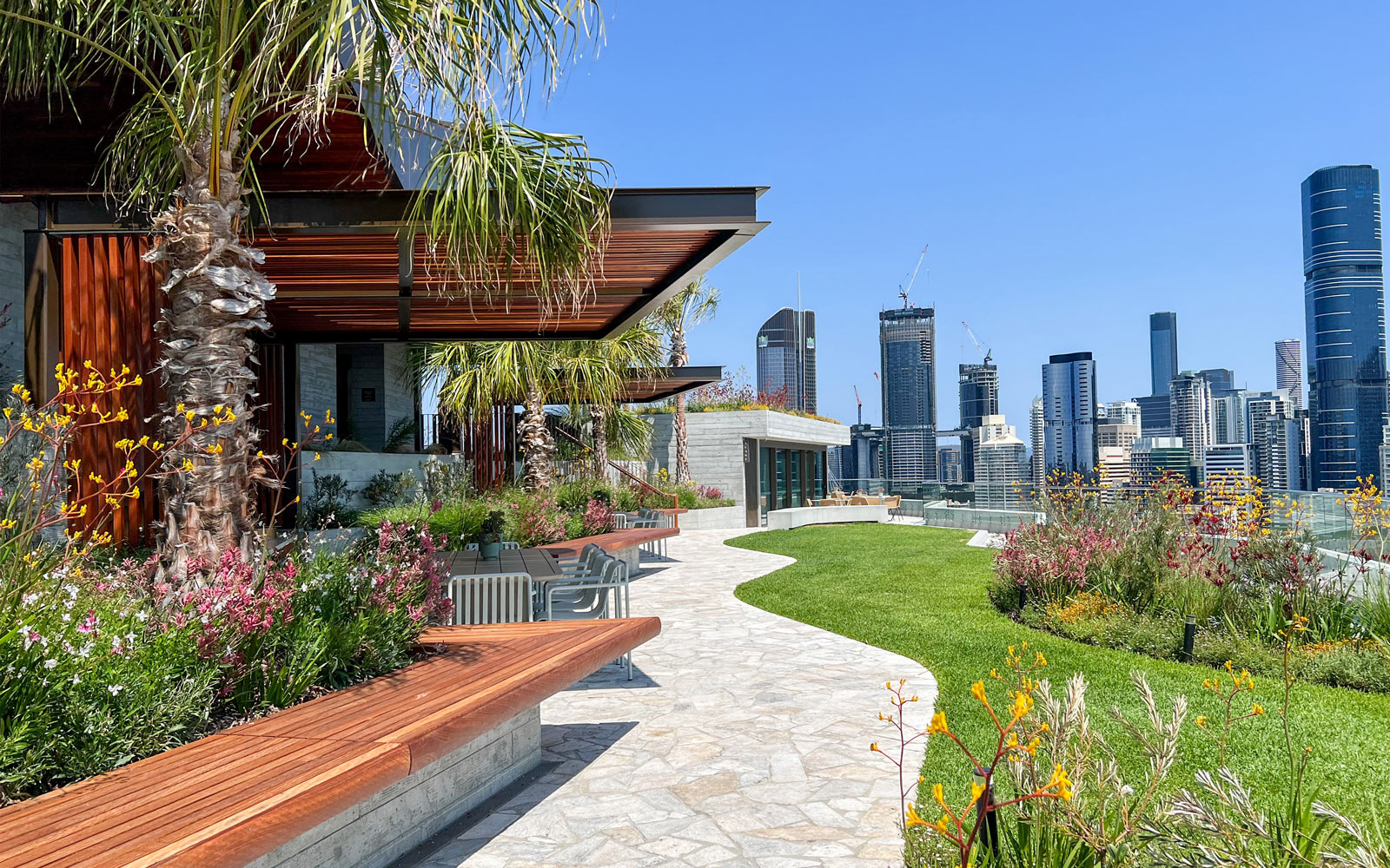 Riviere garden path: the multi-unit residential tower at Kangaroo Point, the recipient of the distinguished Award of Excellence in the Gardens category. 