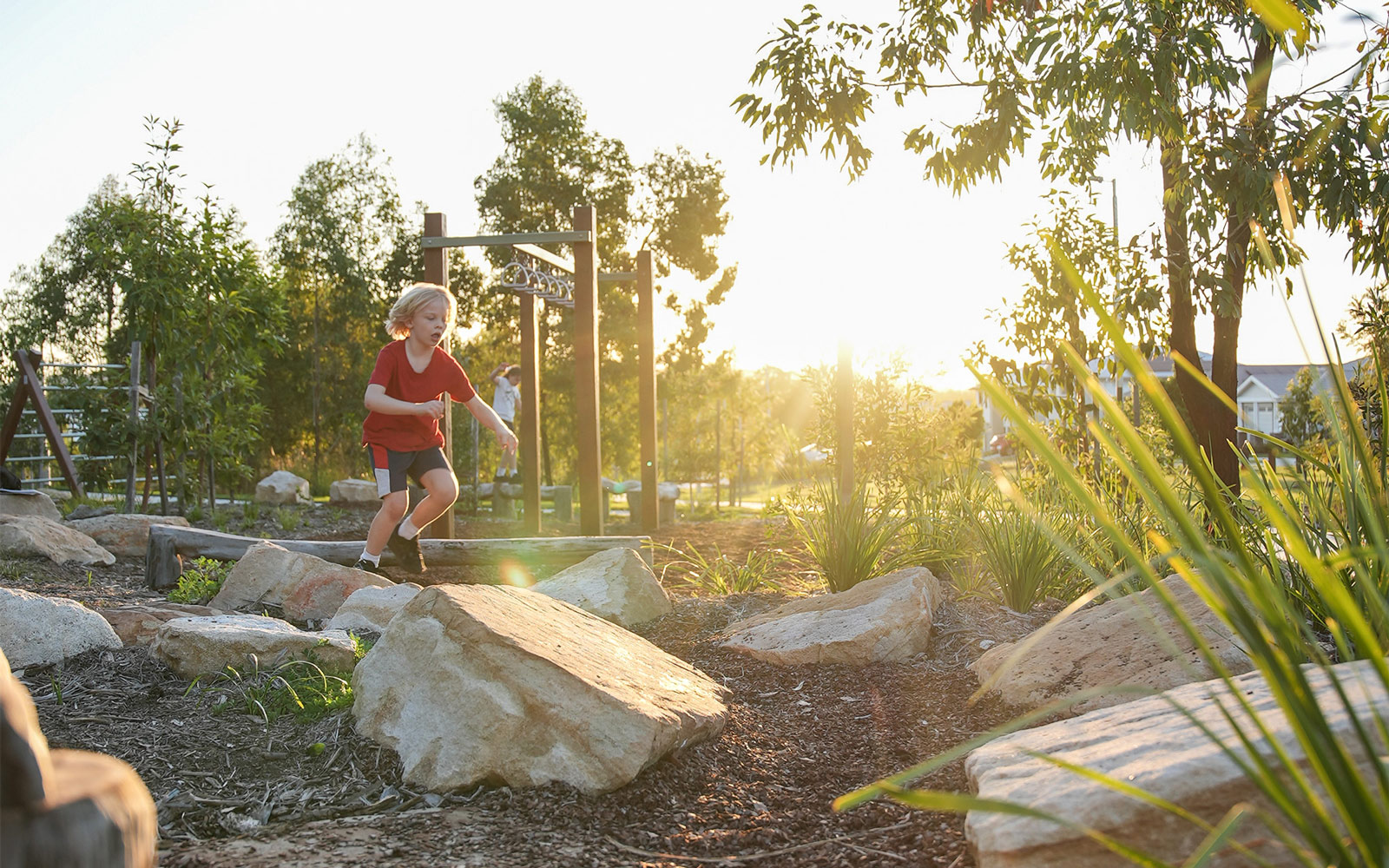 Boy plays in Yarrabilba - Borrol Lookout Park